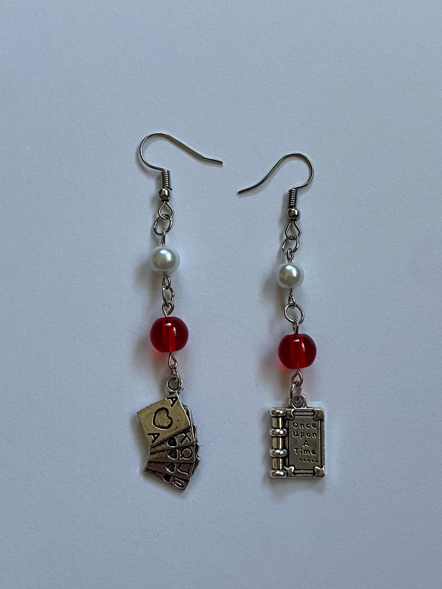 read & make out pearl earrings