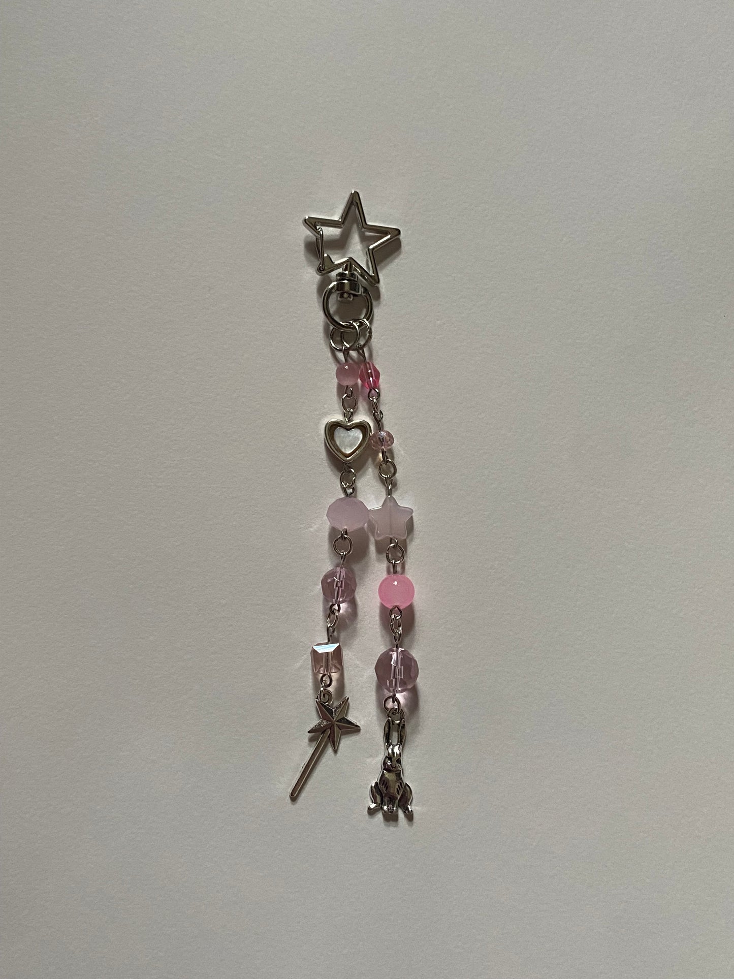 pink wand supernova star keychain