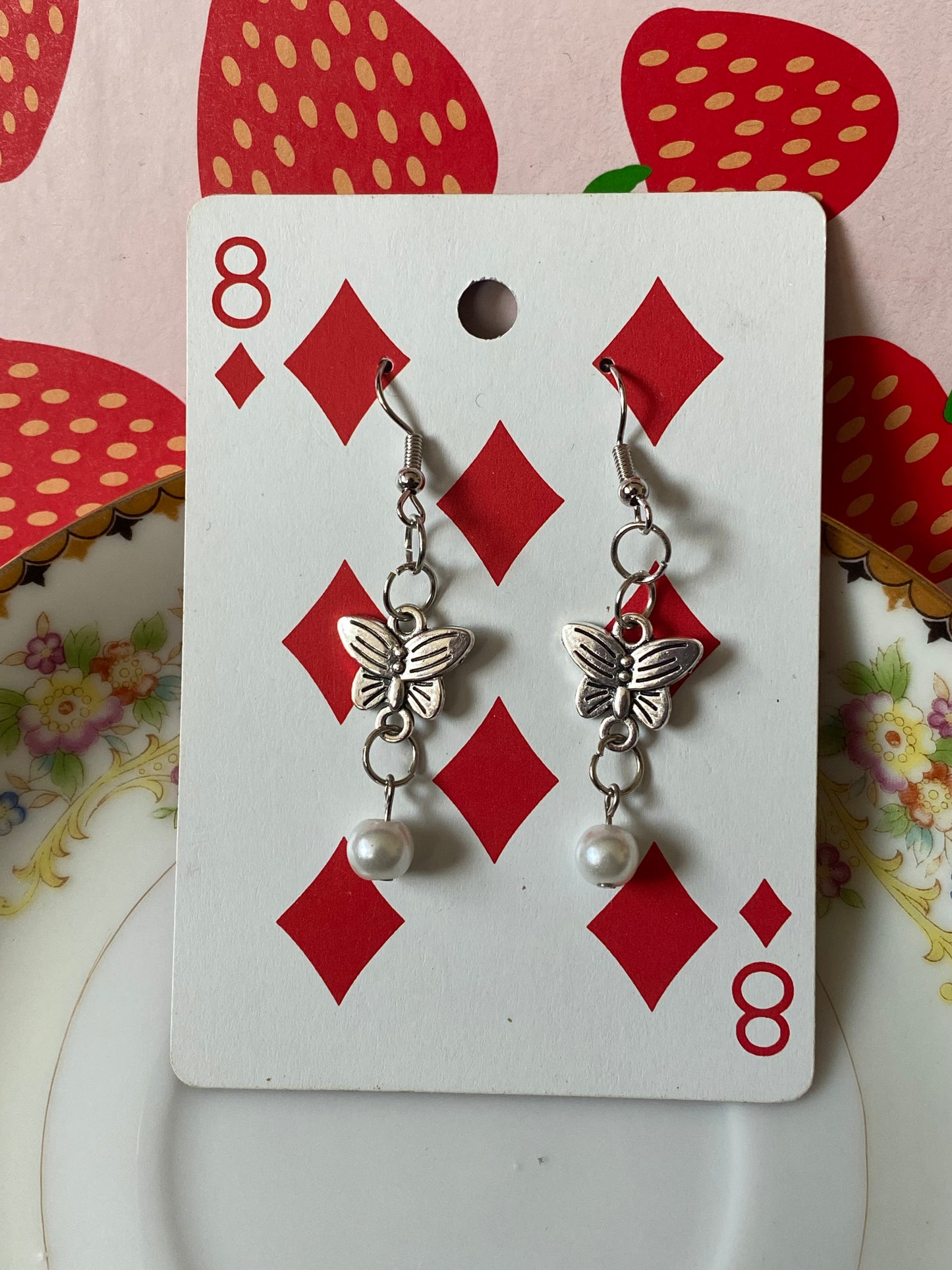 butterfly pearl earrings