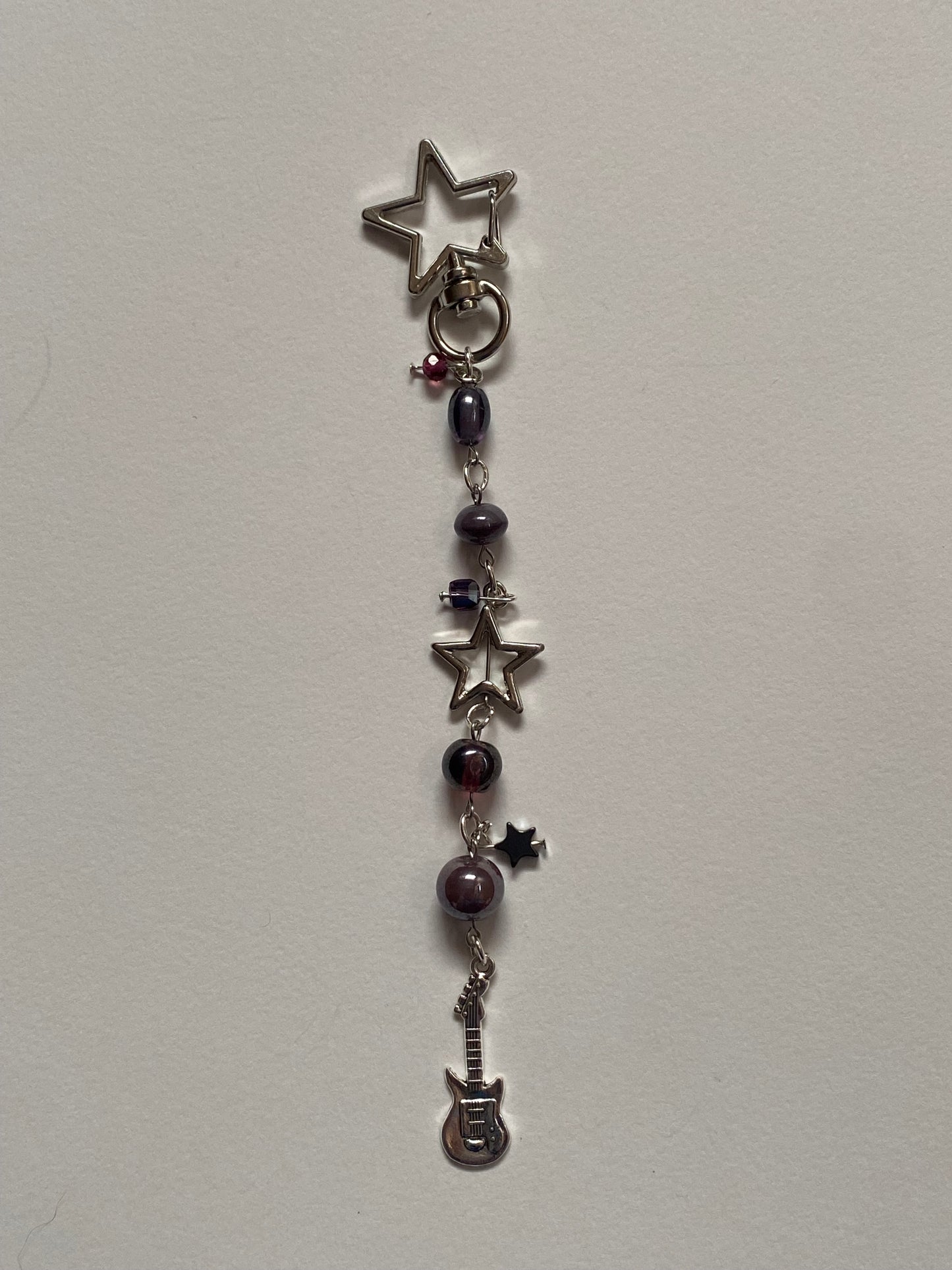 purple star guitar keychain