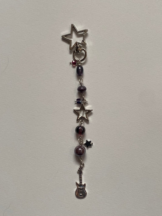 purple star guitar keychain