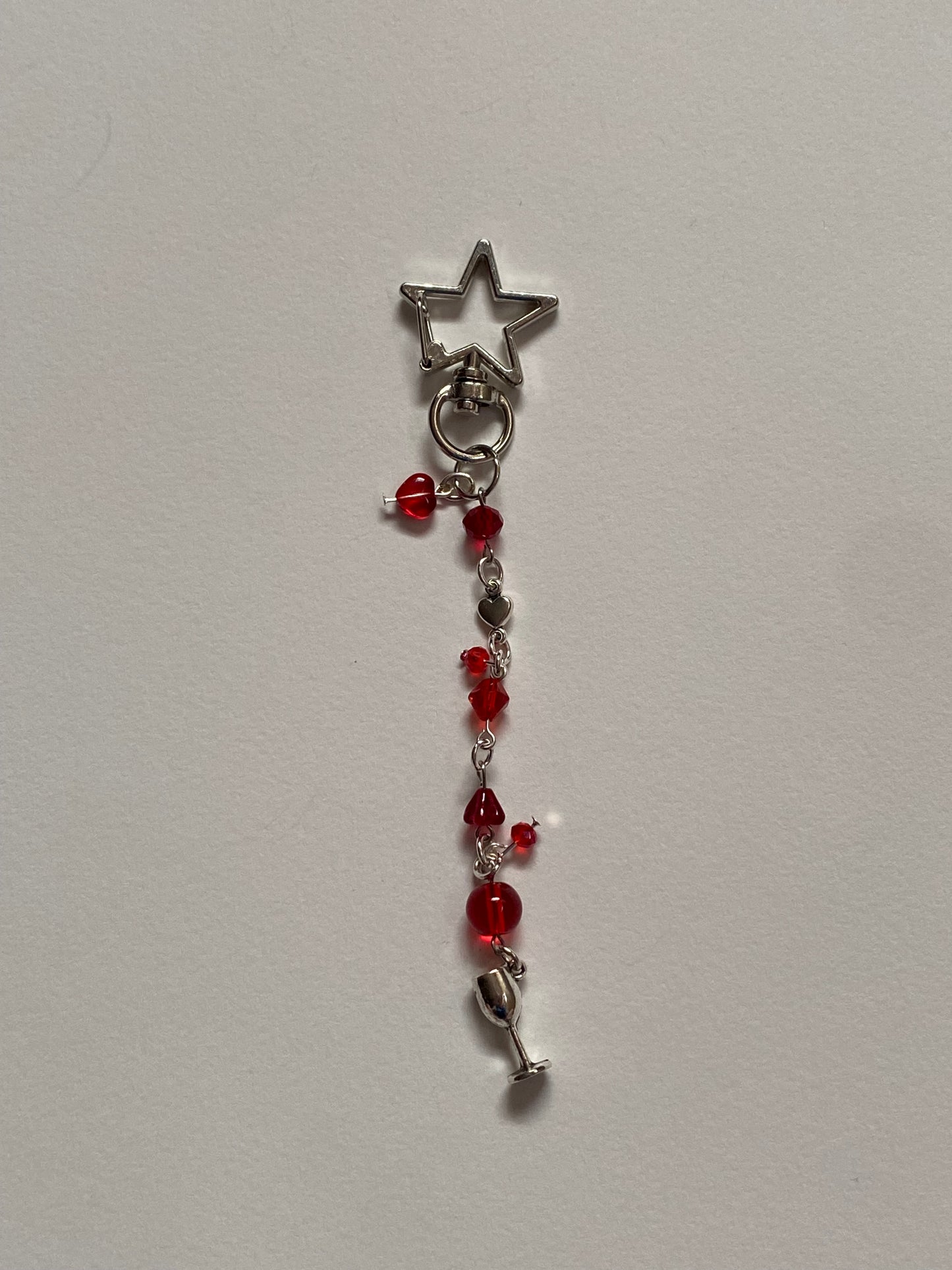 red wine supernova keychain