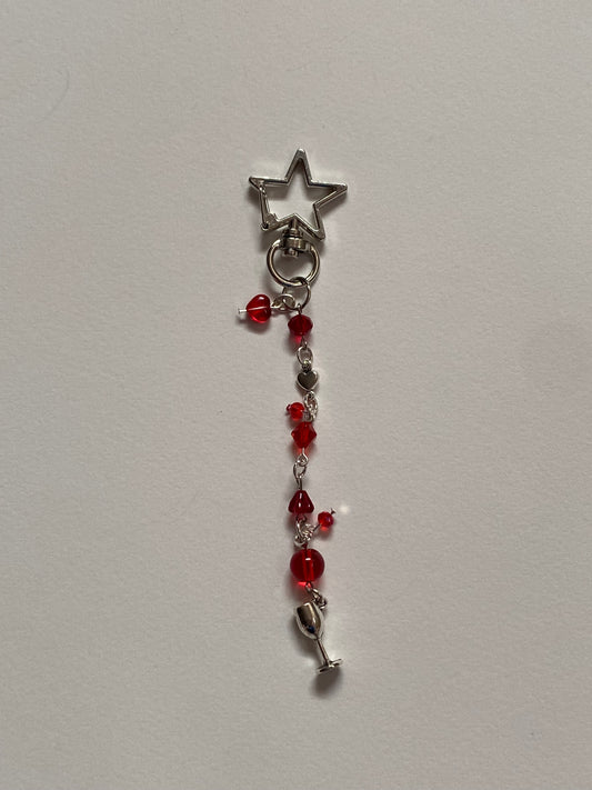 red wine supernova keychain