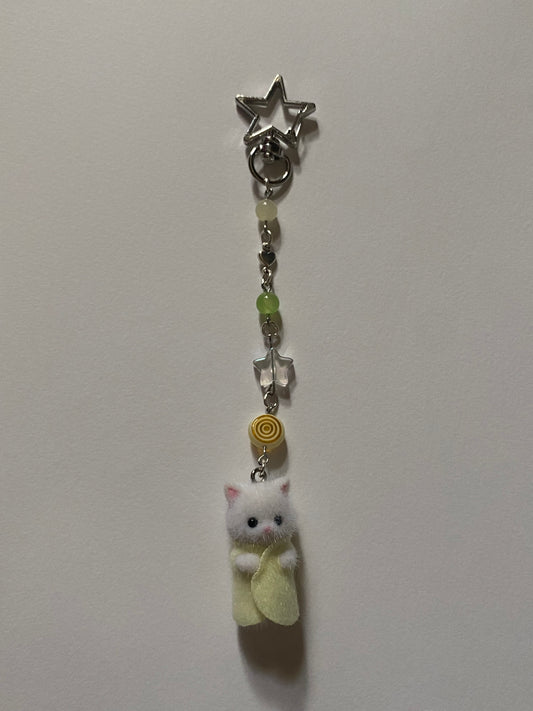 green and yellow star critter keychain