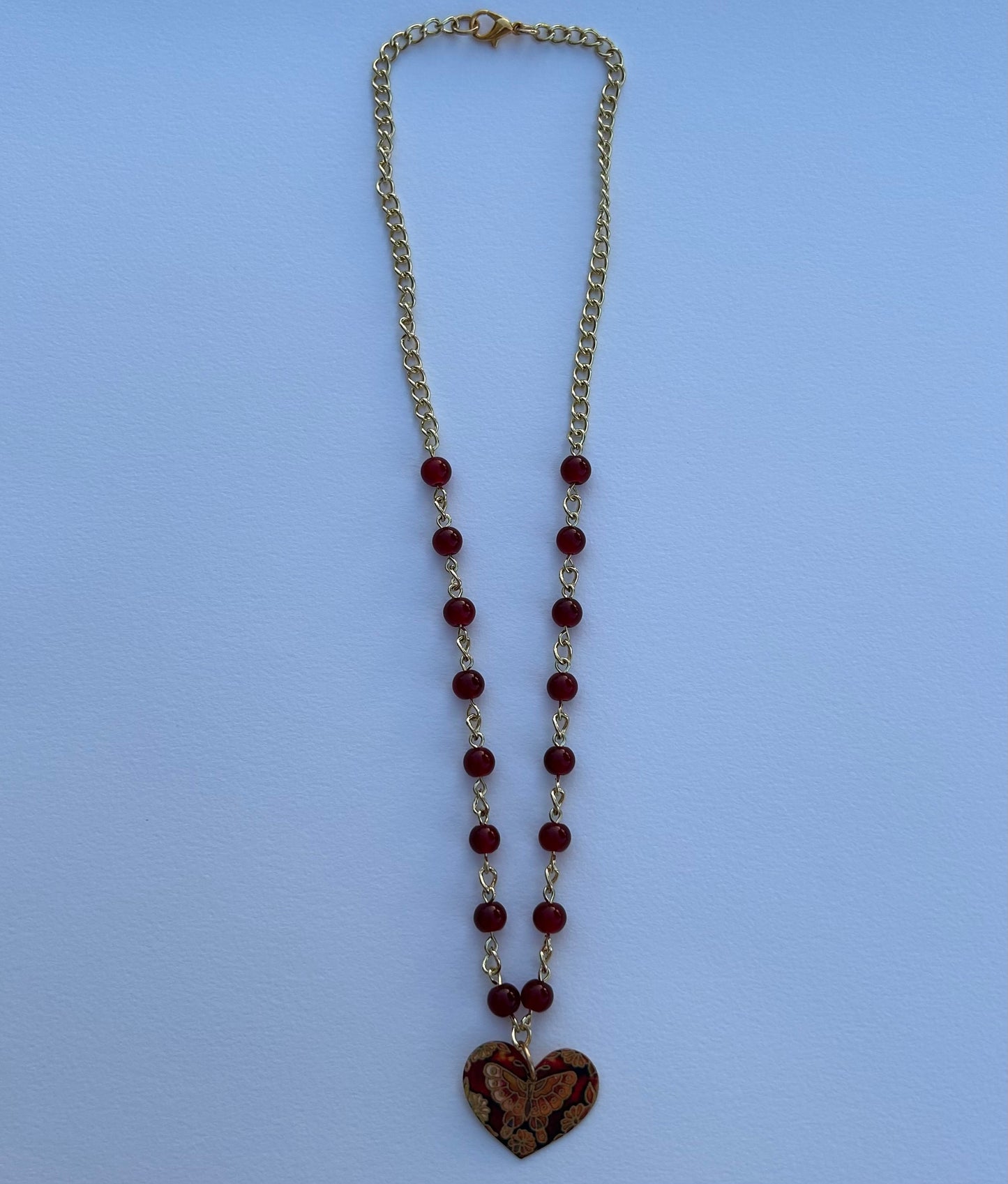 the golden red butterfly necklace
